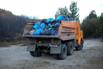 Вывоз строительного мусора заказать недорого в москве